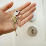 Person holding key